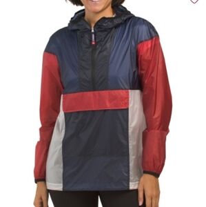 Perfect Moment Ultra Light Track Jacket in Navy/Red